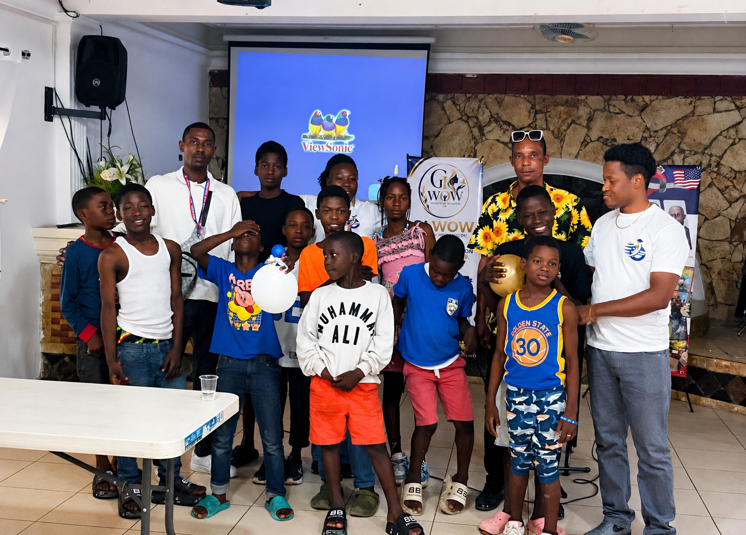 Children and organizers of the Street to Hope Project gathered together at a community event