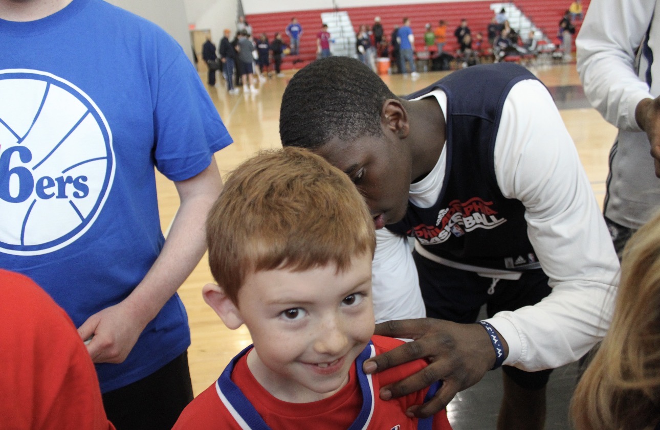 Young Justin at a 76ers event