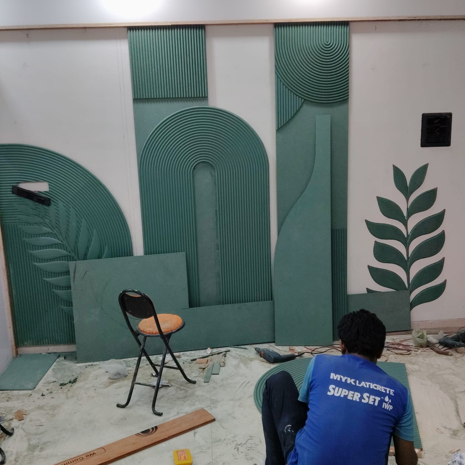 Real work · Furniture & Interiors — CNC fluted feature wall — in progress