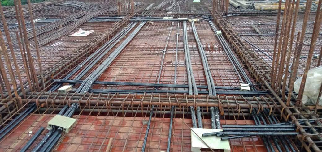 Real work · RIMS Hospital, Manipur — Conduit routing across the beam grid