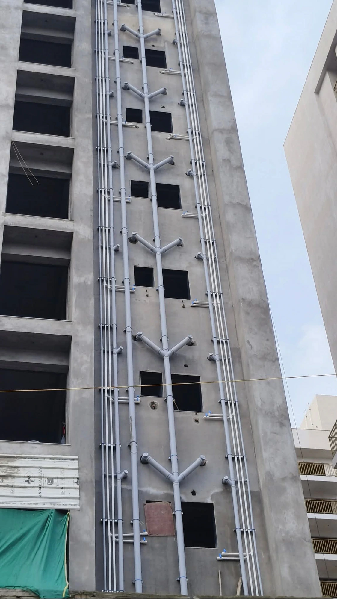 Real work · Plumbing & Piping — Facade drainage network — branch connections