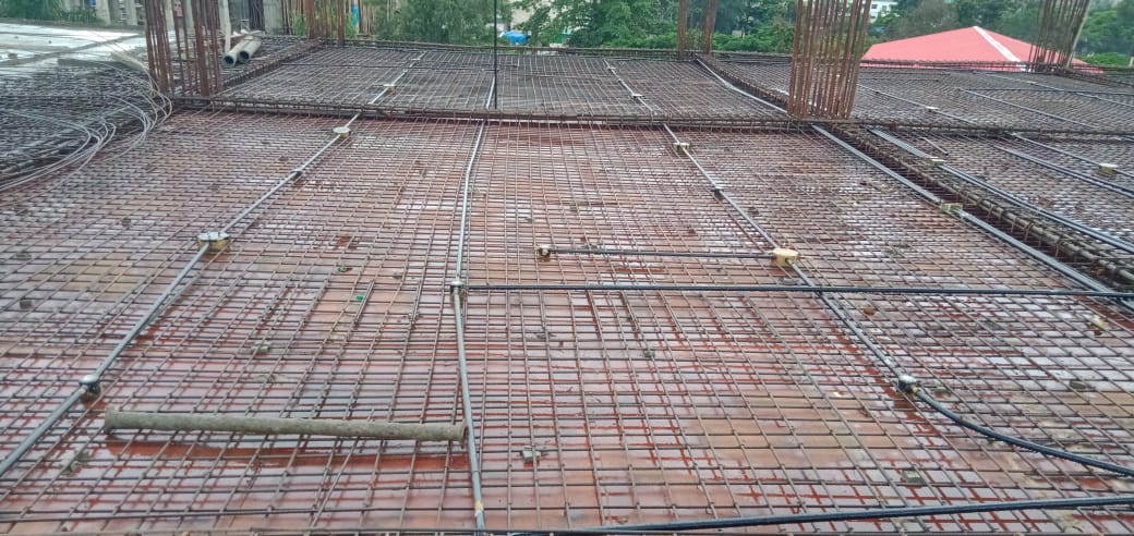 Real work · RIMS Hospital, Manipur — Full-slab conduit network — day shift