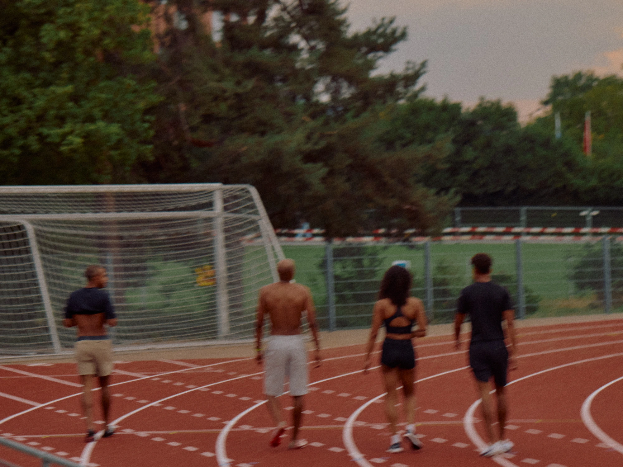Coach talking with athletes