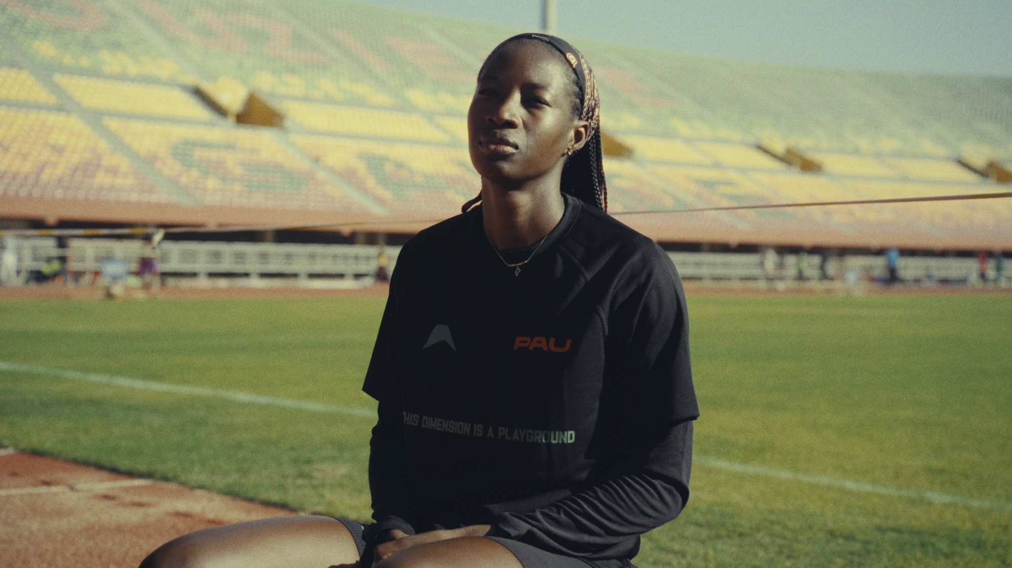Arame in PAU gear at stadium