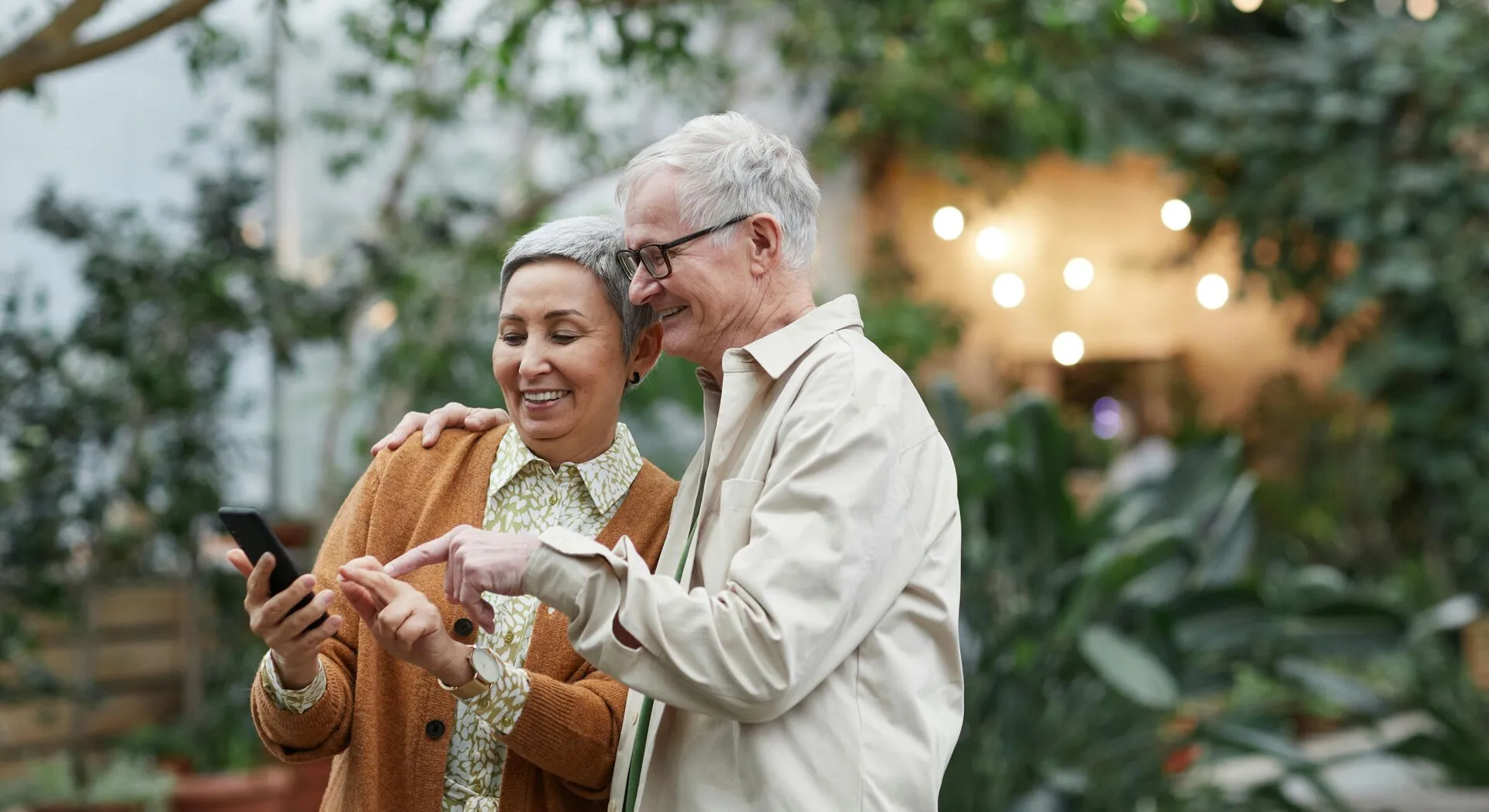 Couple reviewing energy options on a smartphone