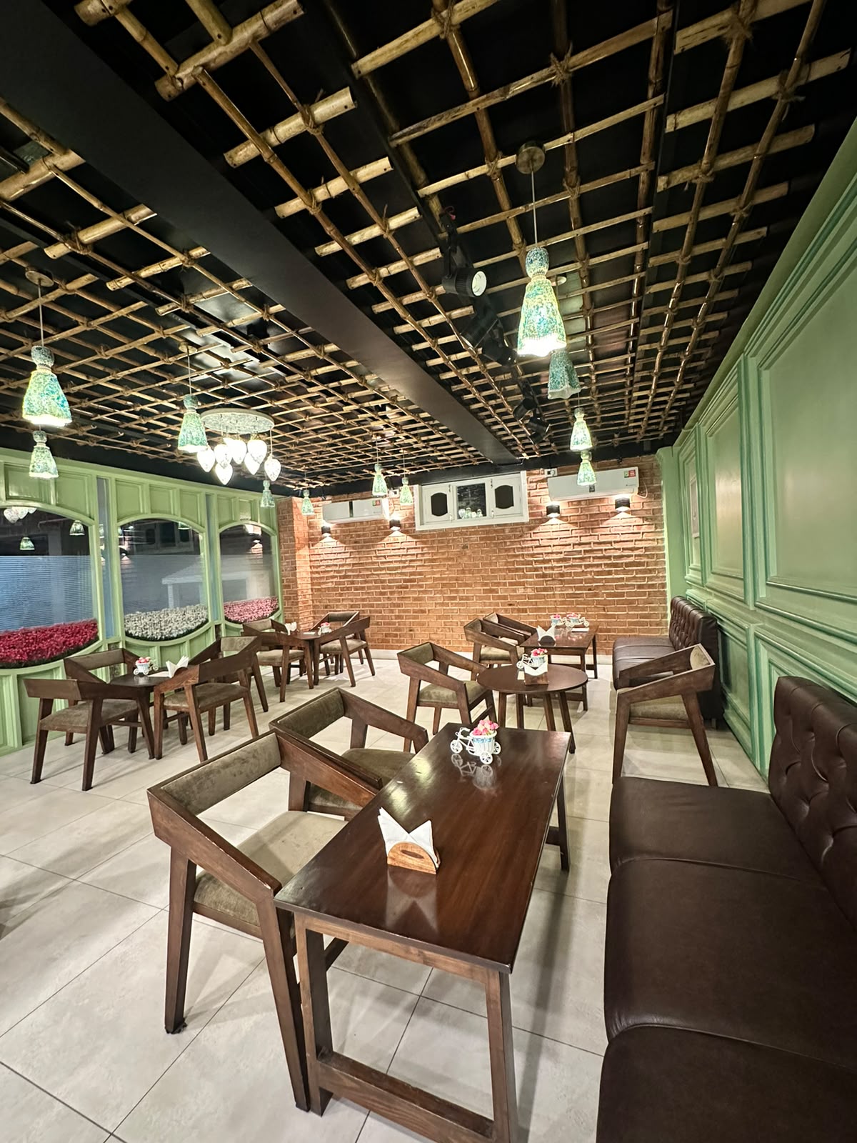 Brick, bamboo and the evening tables.