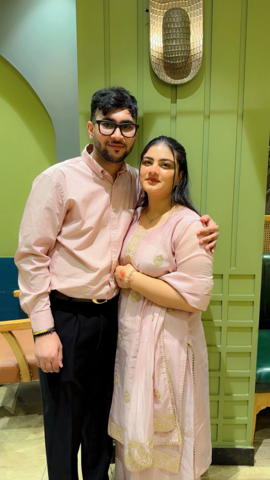 Sarthak and Tanishka in rose and gold traditional attire