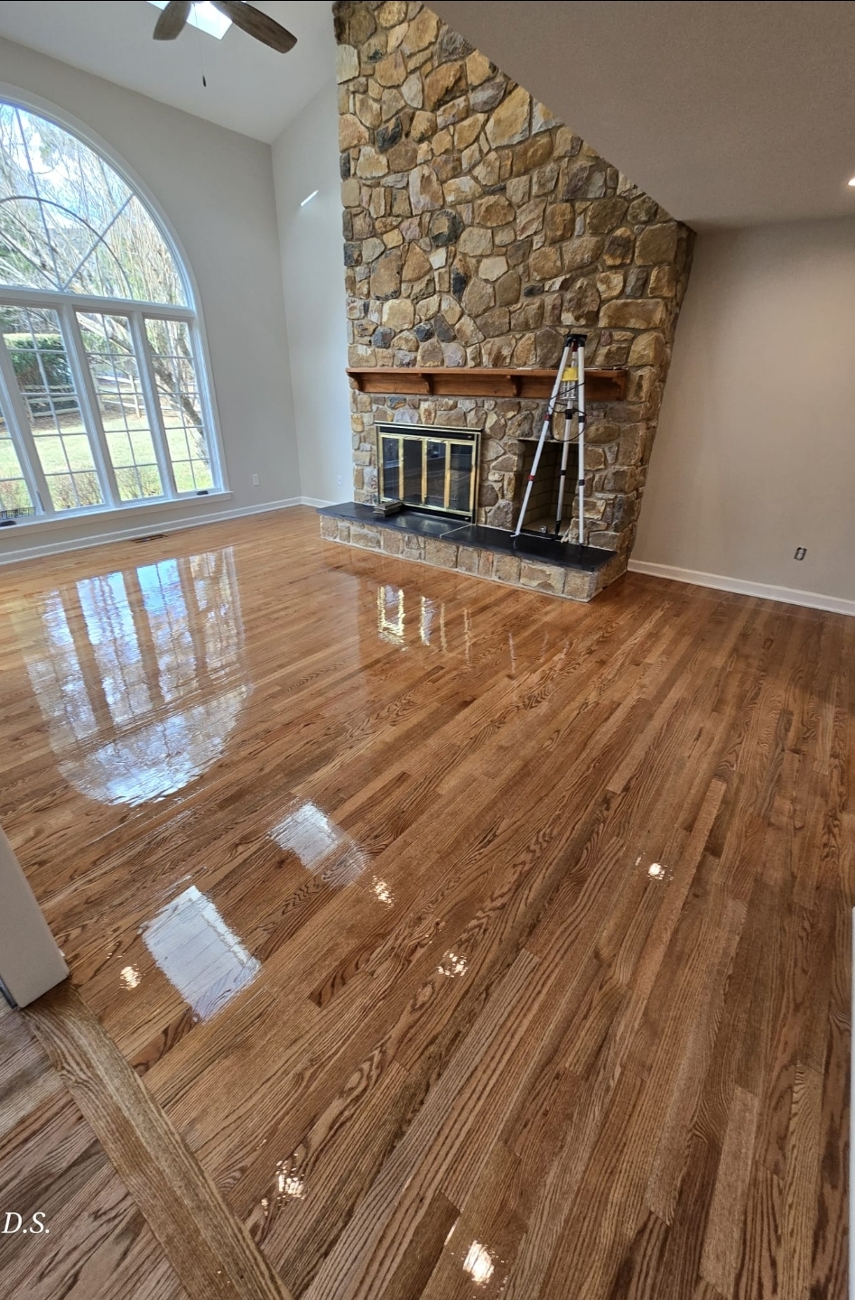 Installed oak hardwood floor in a bright Pennsylvania room