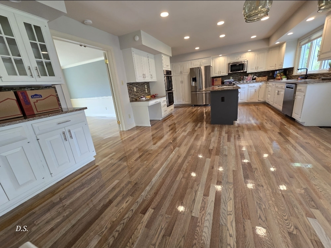 Warm architectural interior with finished hardwood floors