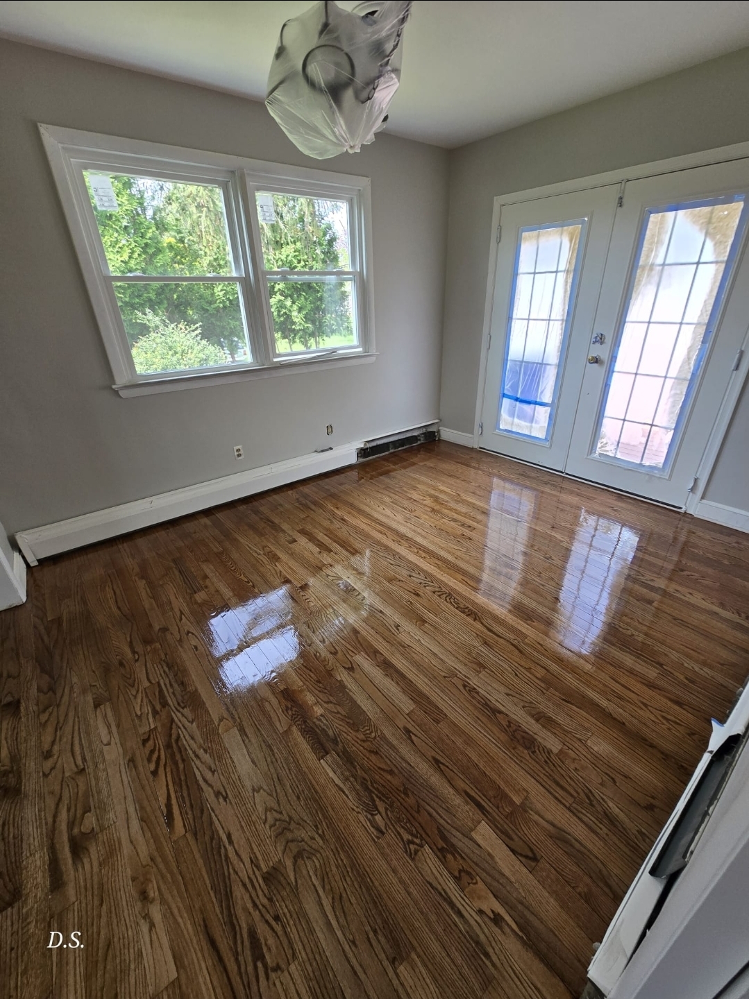 Dark stained hardwood floor in a Pennsylvania hallway