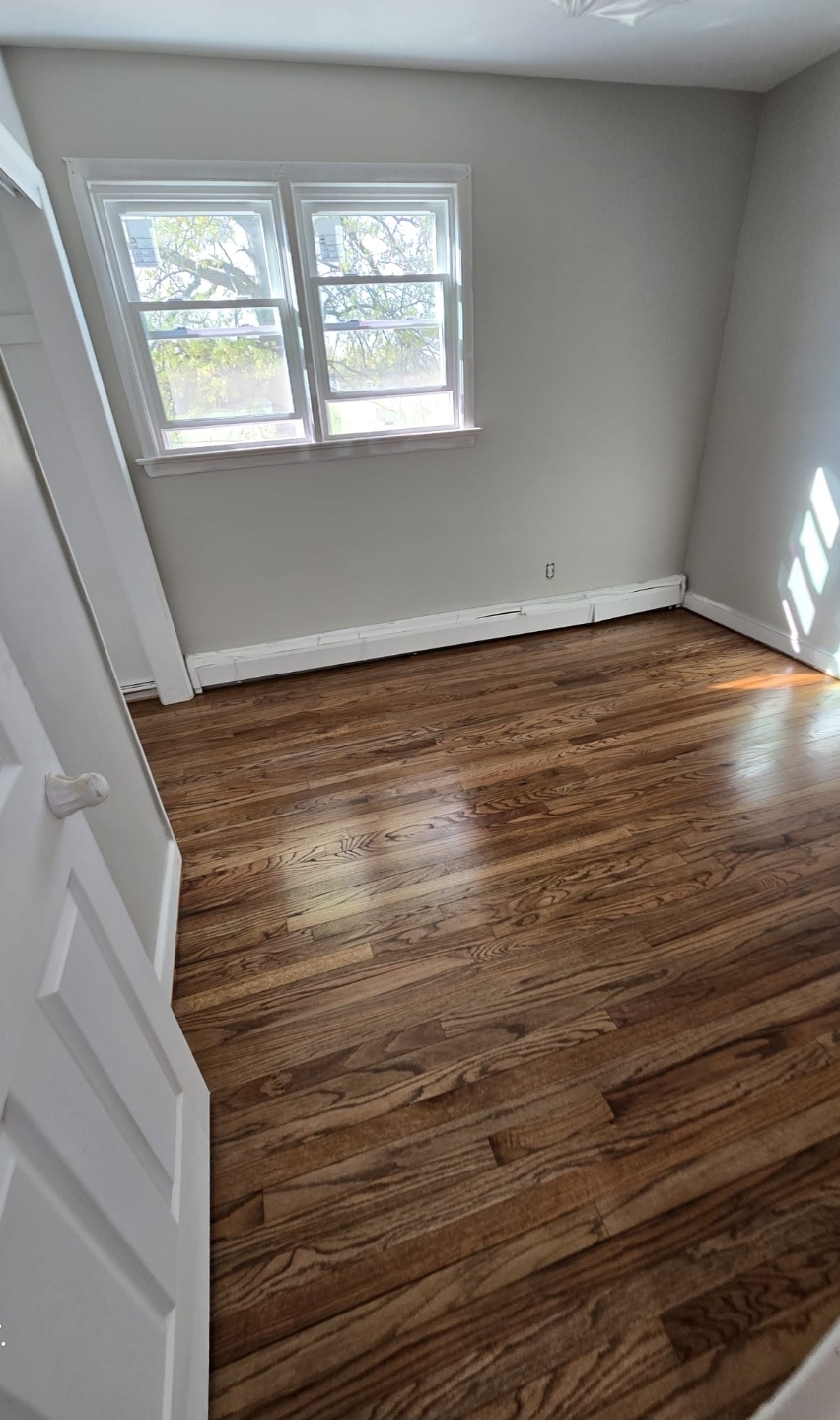 Completed natural wood floor in a Pennsylvania kitchen