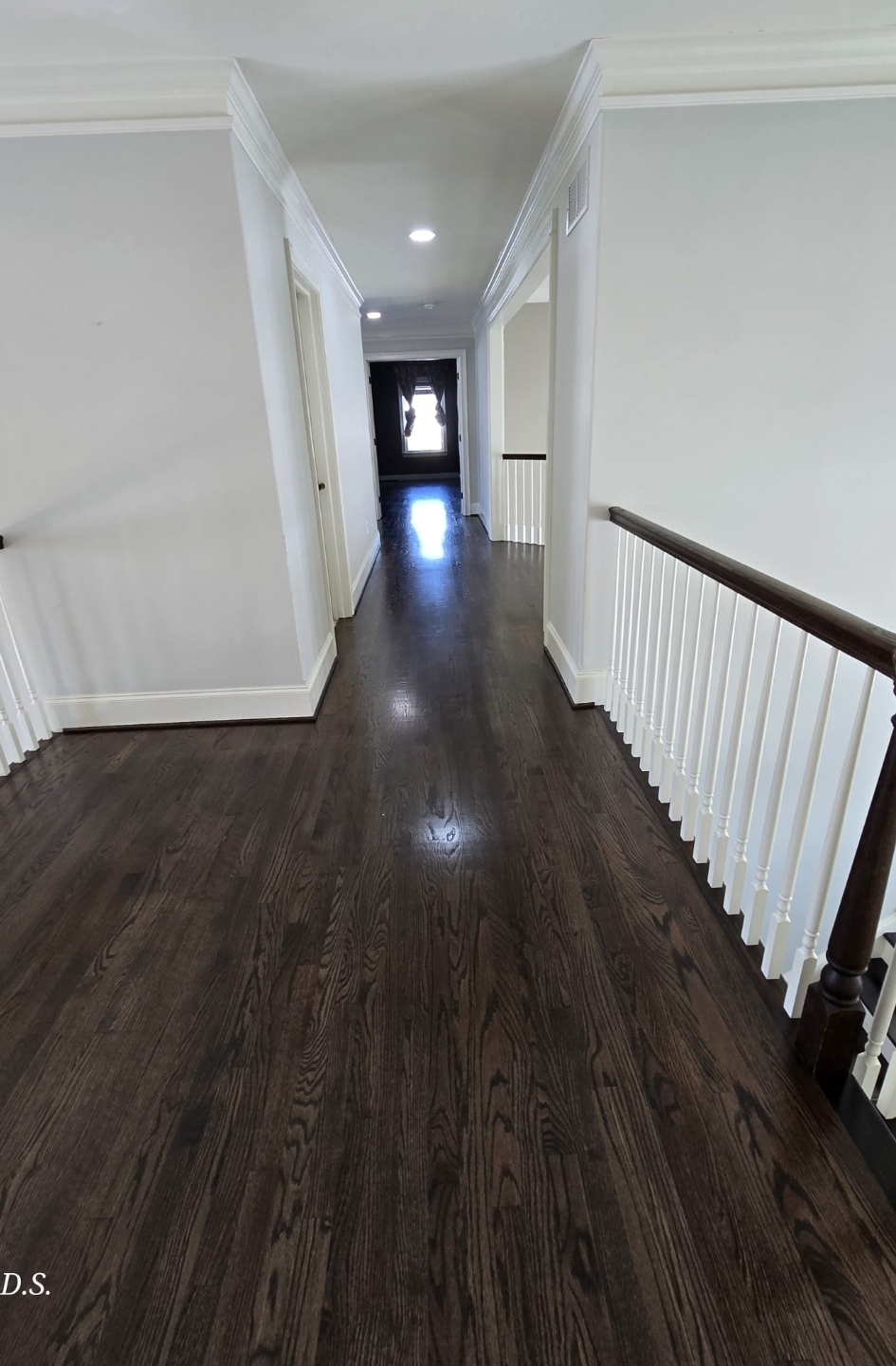 Refinished hardwood floor in a bright Pennsylvania dining room