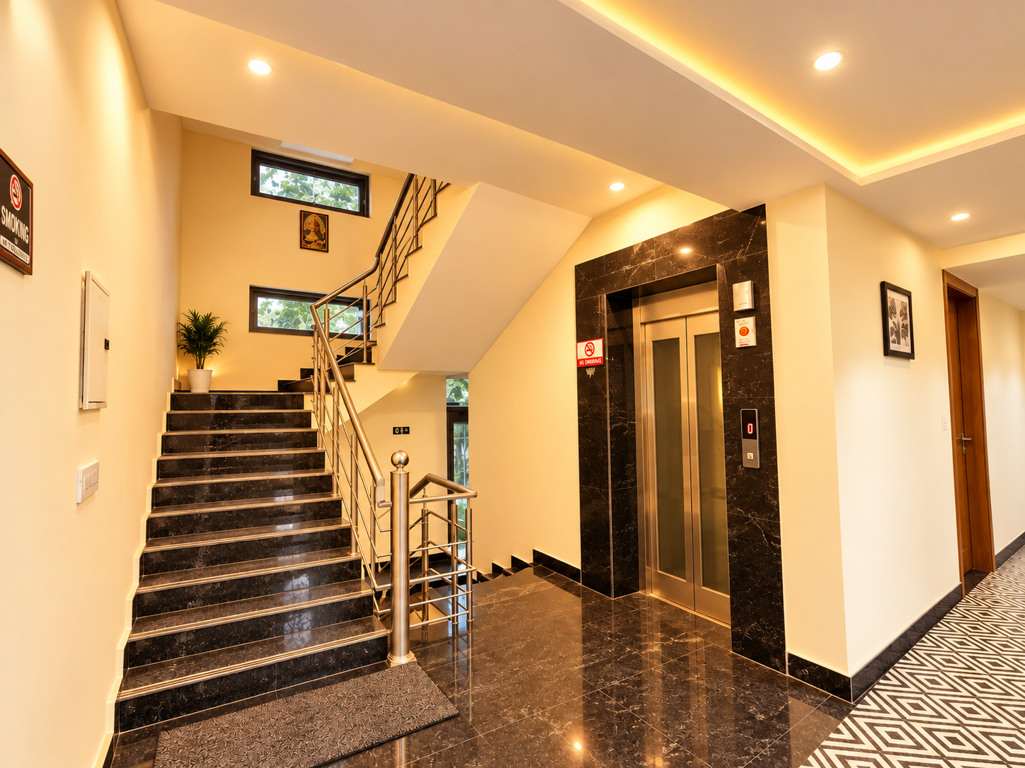 Marble staircase and lift at Hotel Snapstayz