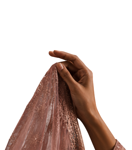 Hand holding embroidered fabric