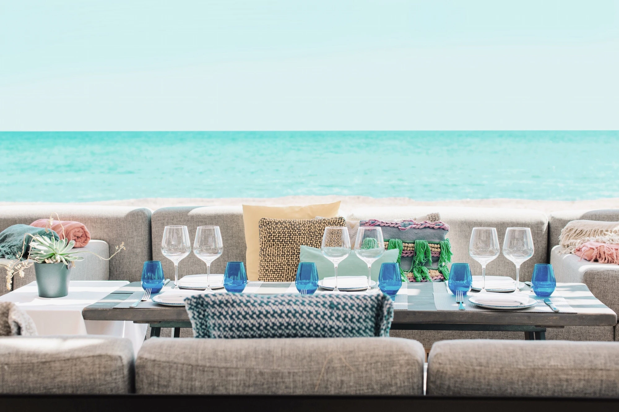 Beachfront dining with turquoise sea views