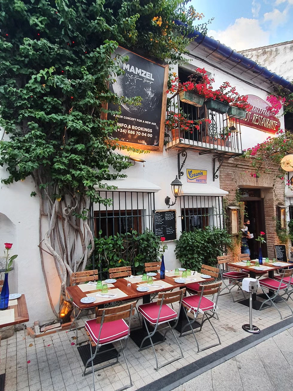 Stylish open-air dining patio in Marbella