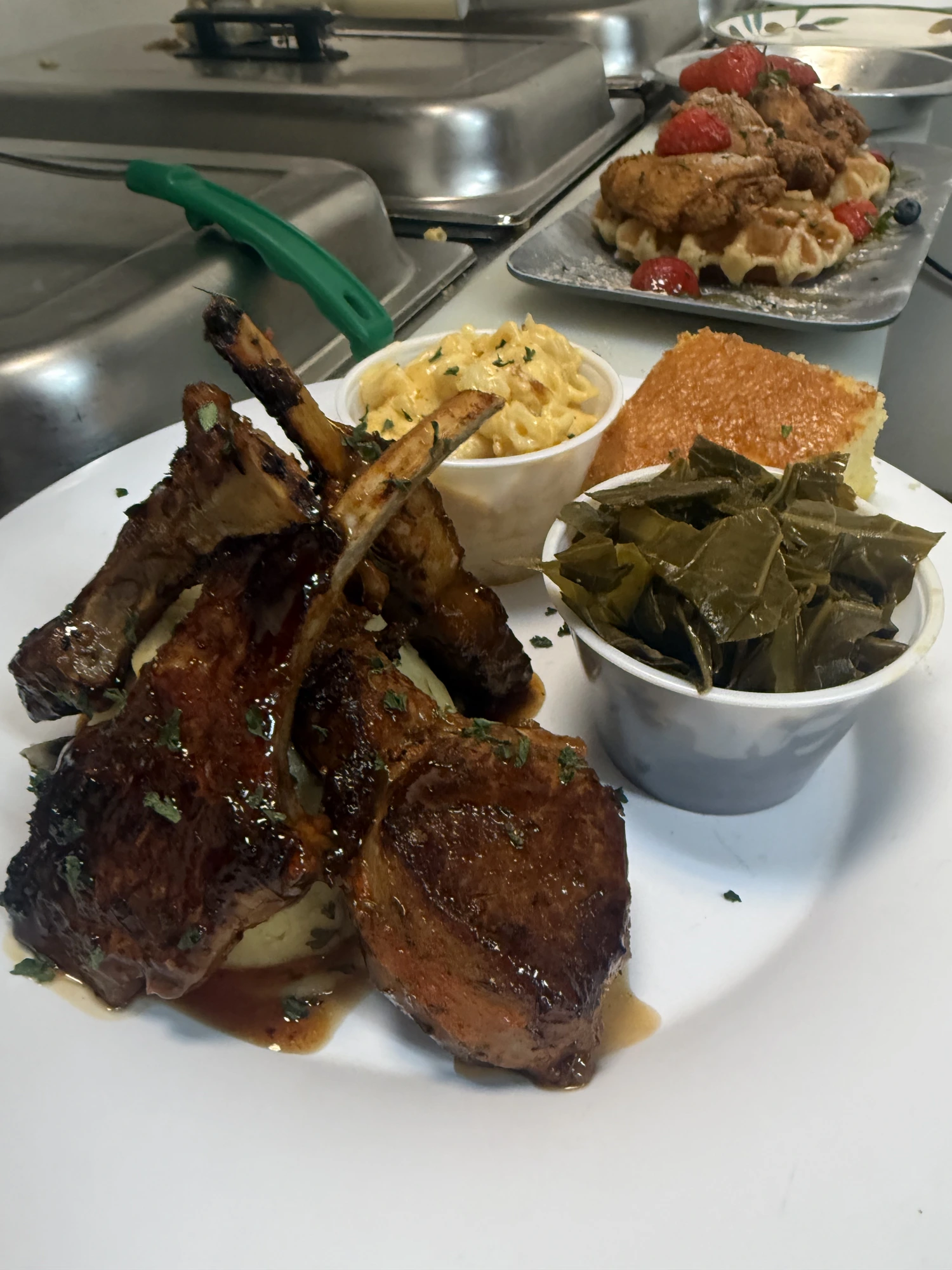 Lamb chops with mac, collards and cornbread — chicken & waffles behind
